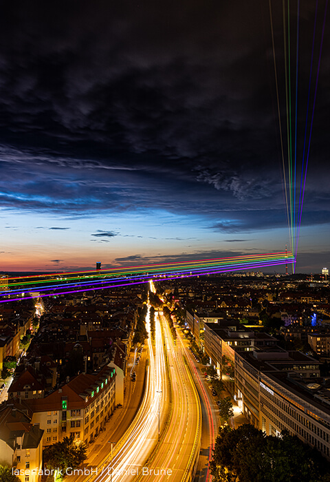 #unitedinpride laser rainbow above Munich