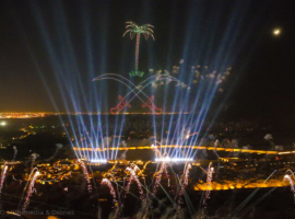 Searchlights shine up and the 3D KSA palm emblem thrones above the VIP banquet