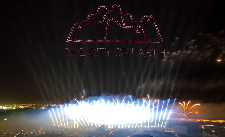 The City Of Earth drone picture with searchlights