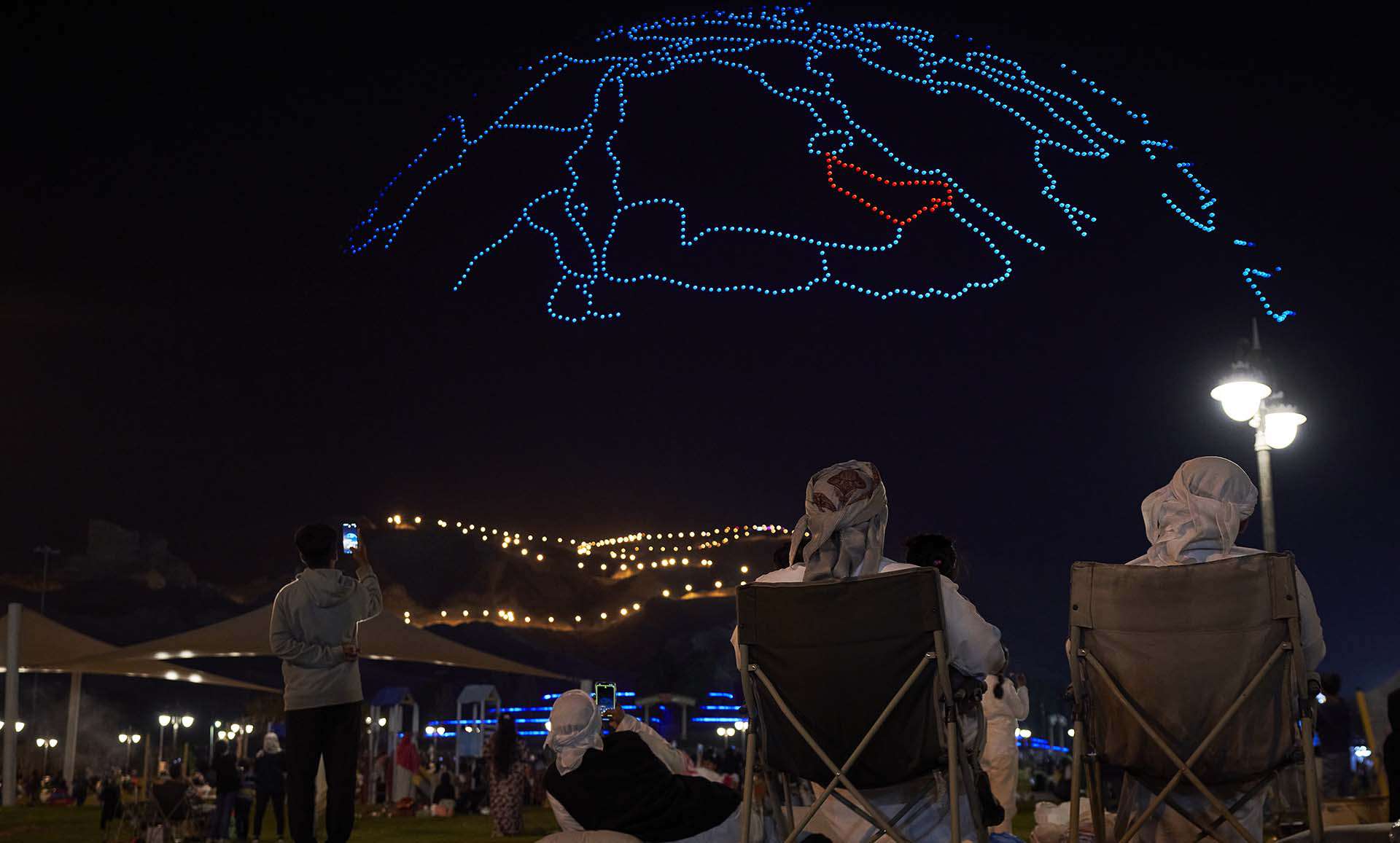 Drones create a hemisphere of the globe with a view to Arabian Emirates during National Day 2023 in Al Ain